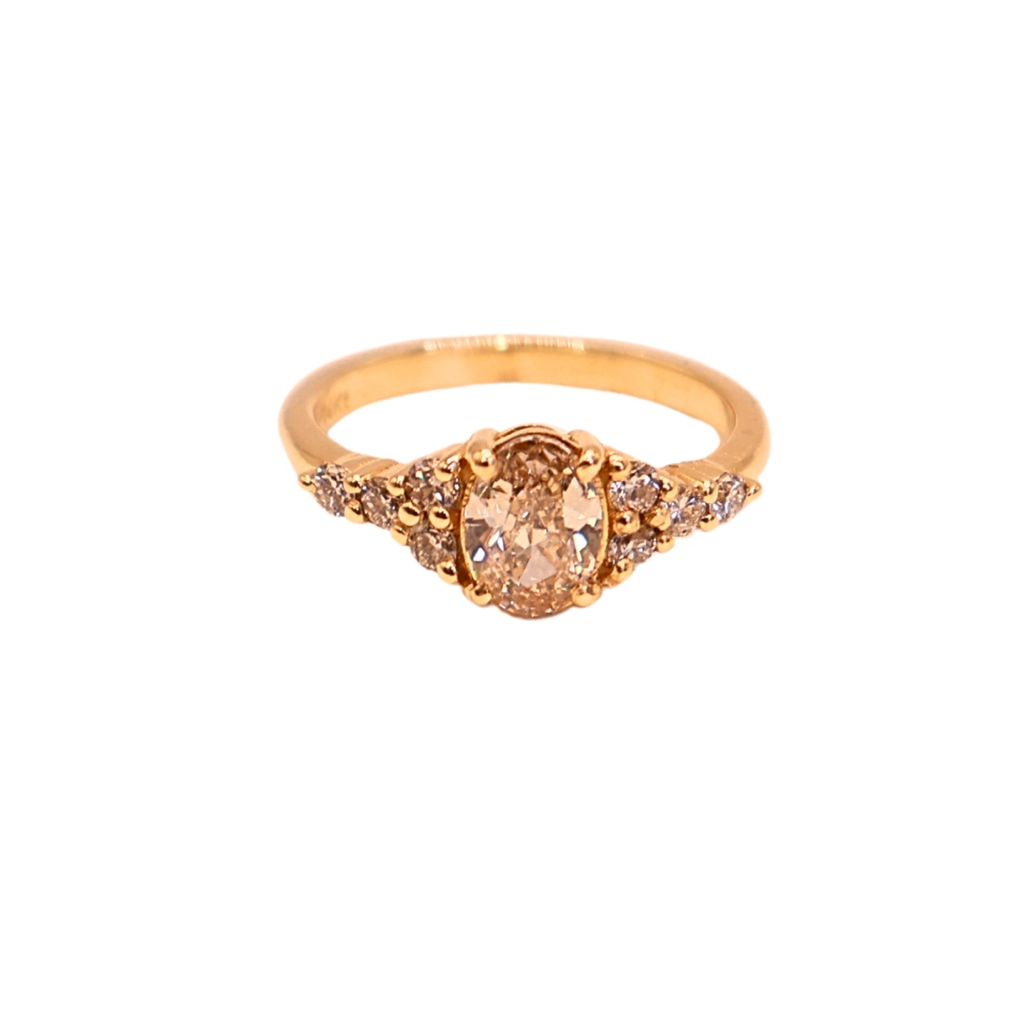 Oval ring with side stones yellow gold 0.75 carat