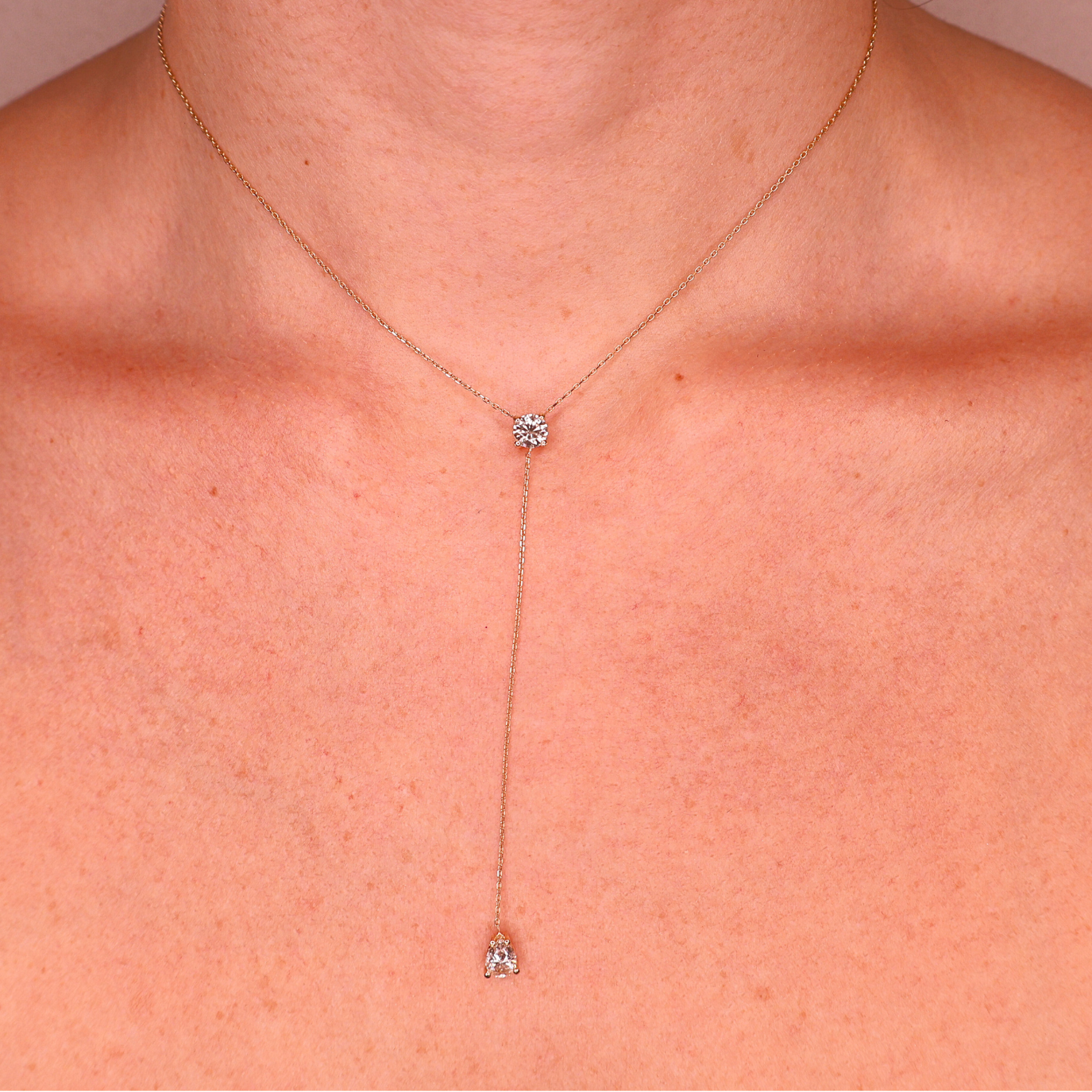 Two-stone drop and round yellow gold necklace 0.52+0.48 carat