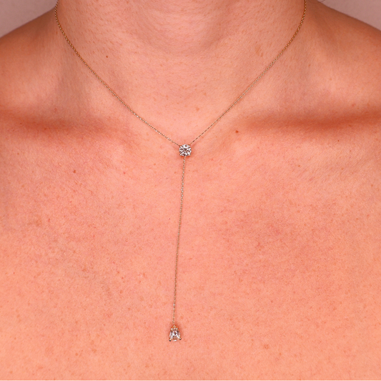 Two-stone drop and round yellow gold necklace 0.52+0.48 carat